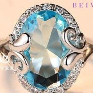 10 for $25/  Blue cz ring